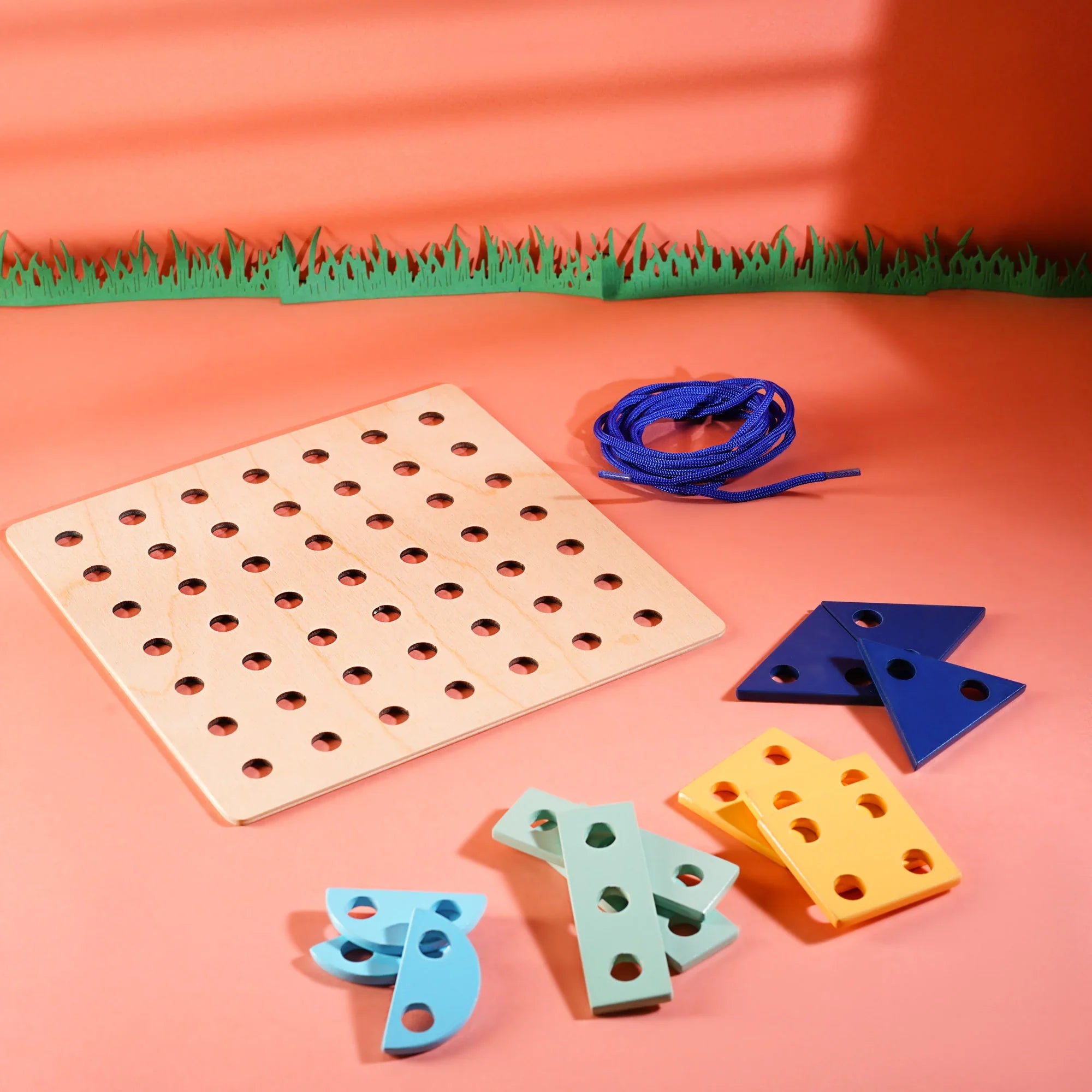 Shape lacing board