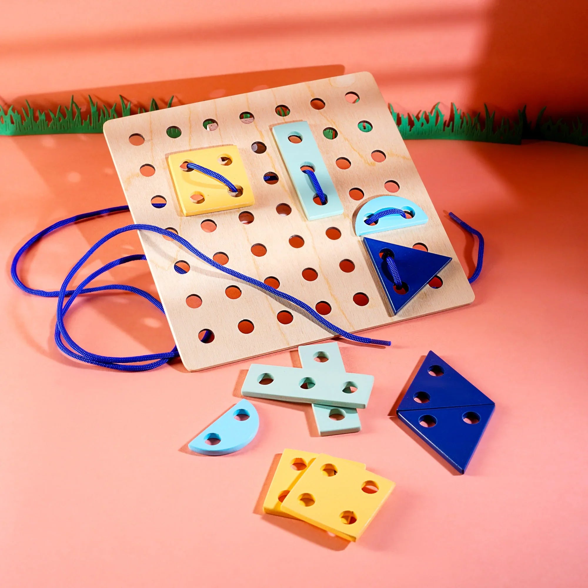 Shape lacing board