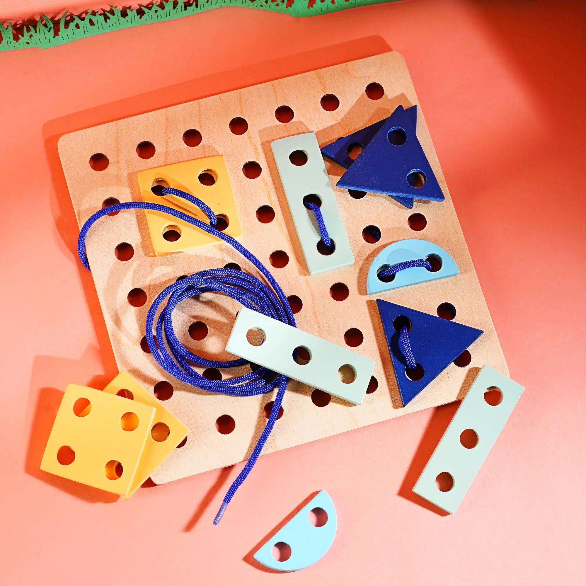 Shape lacing board